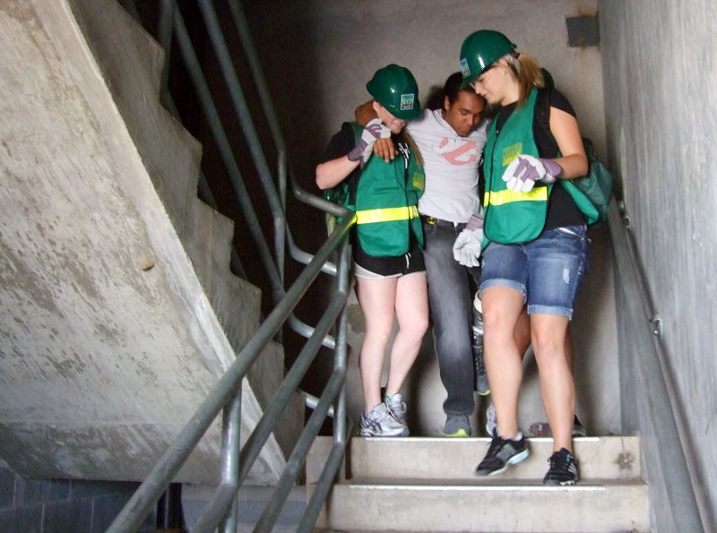 Photo of teens performing training duties